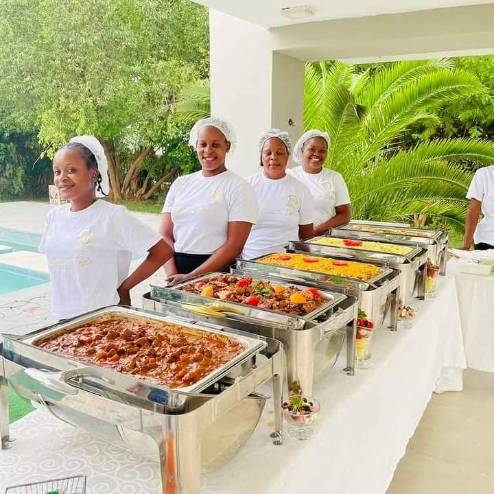 The Fenalt Foods team at a buffet line